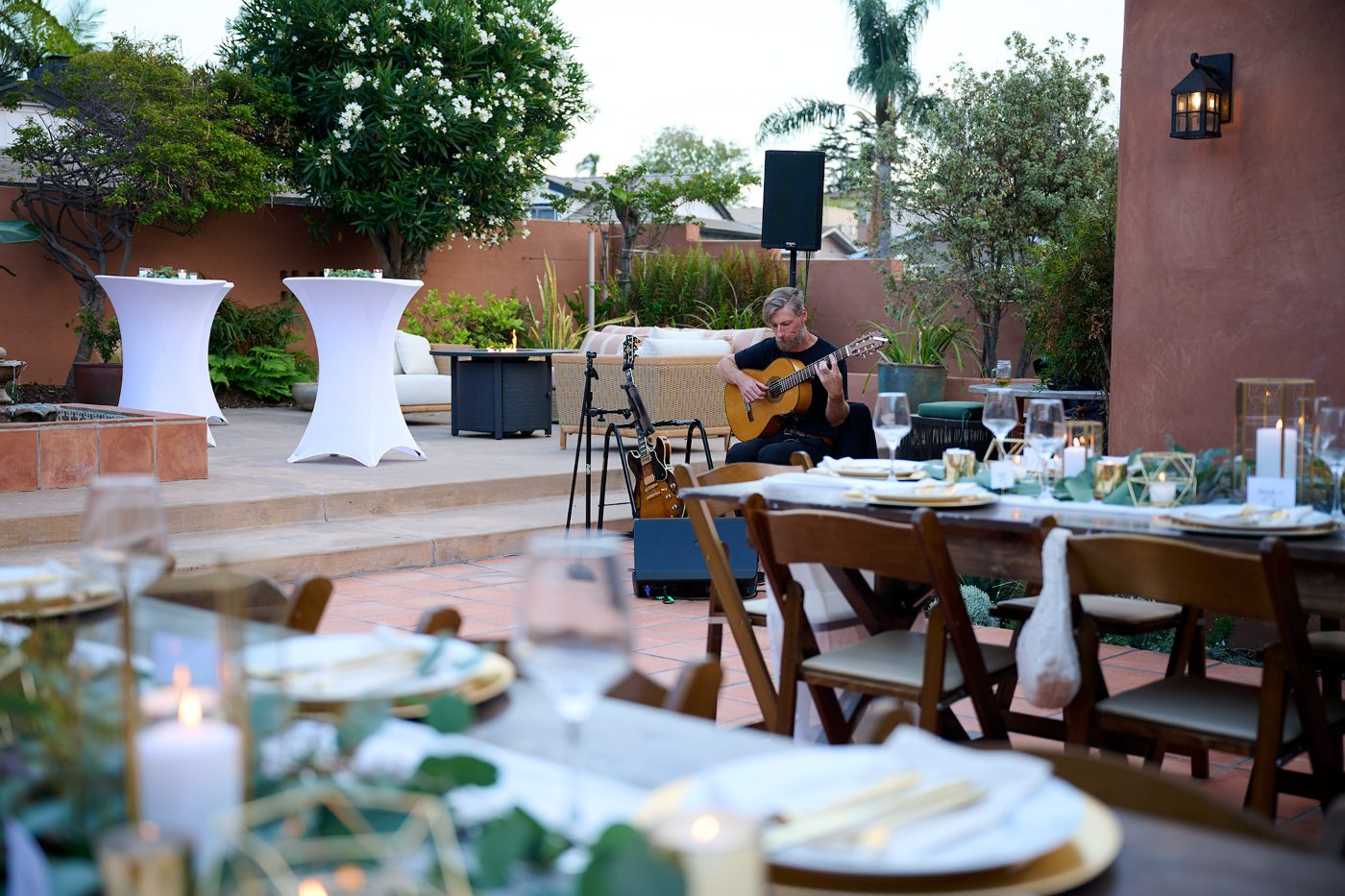 San Diego wedding guitarist Rob Andrew's solo setup with PA speaker at an intimate outdoor reception